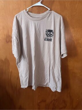 Beige Short-Sleeve Graphic Tee with Skull Chest Print